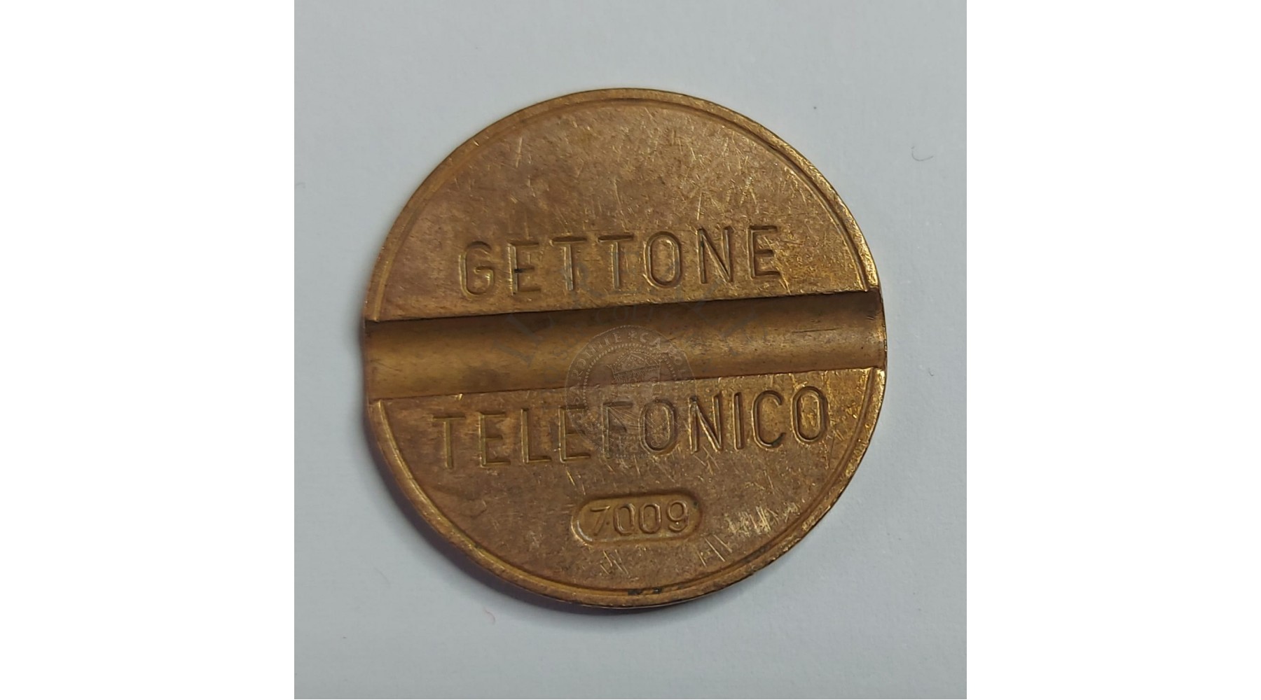 GETTONE TELEFONICO SENZA SEGNO DI ZECCA NUMERO DI SERIE 7009 RARO