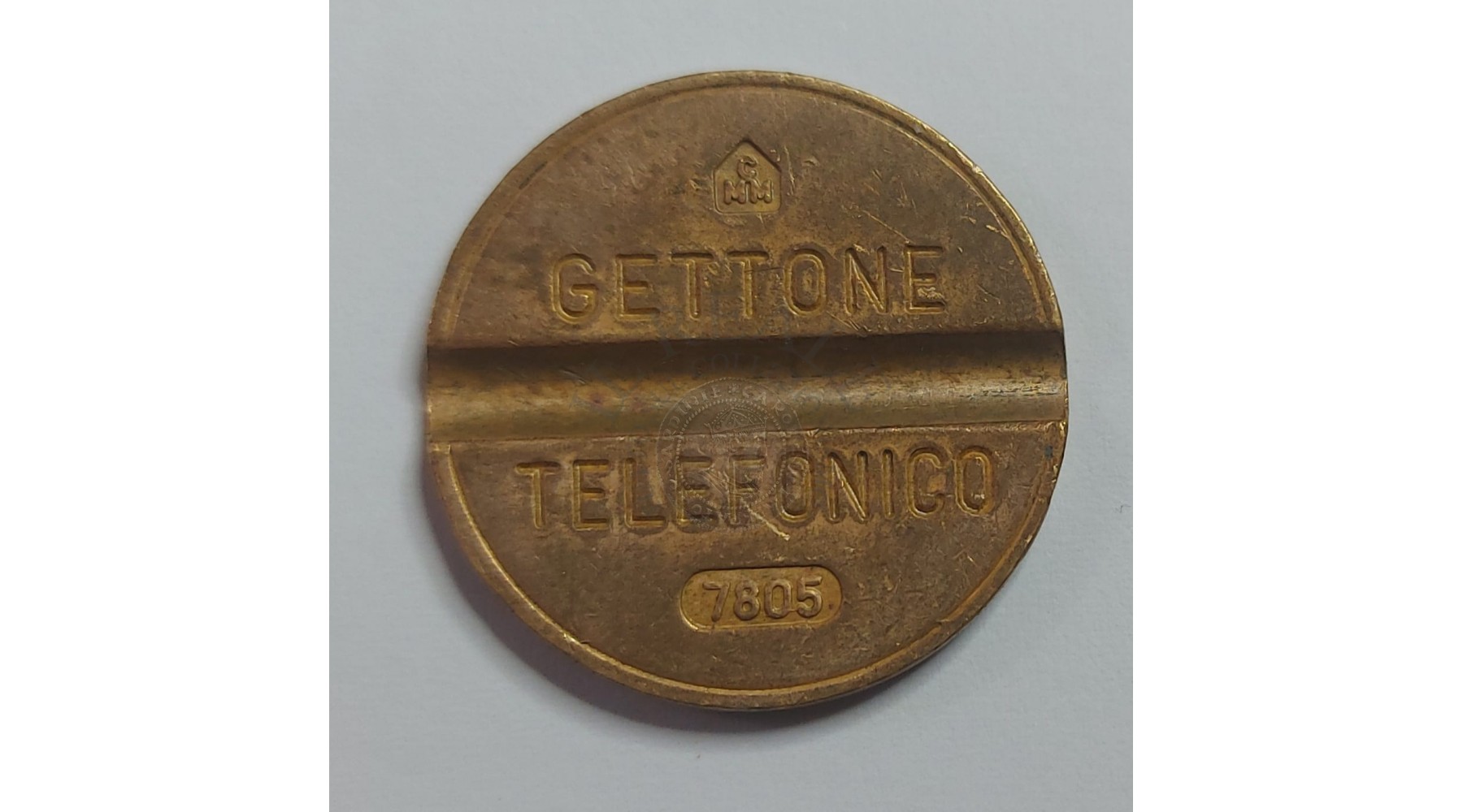 GETTONE TELEFONICO CON SEGNO DI ZECCA NUMERO DI SERIE 7805 RARO