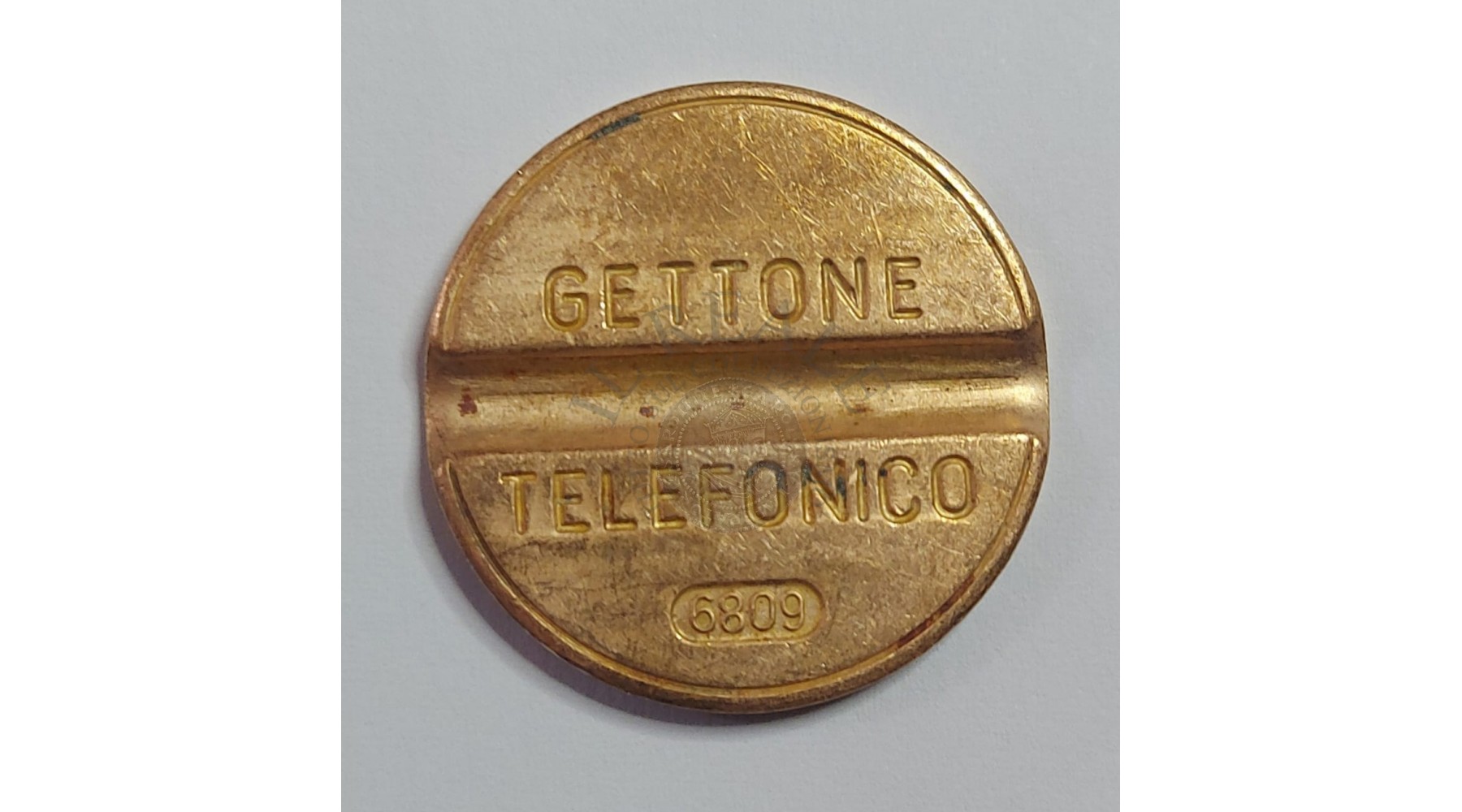 GETTONE TELEFONICO CON SEGNO DI ZECCA  NUMERO 6809