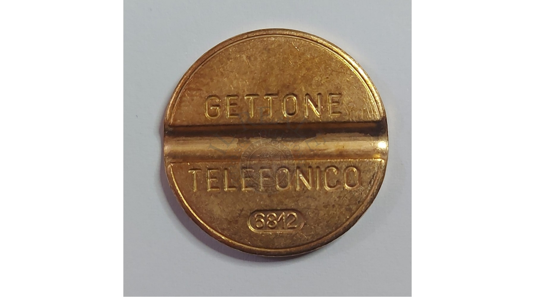 GETTONE TELEFONICO CON SEGNO DI ZECCA  NUMERO 6812