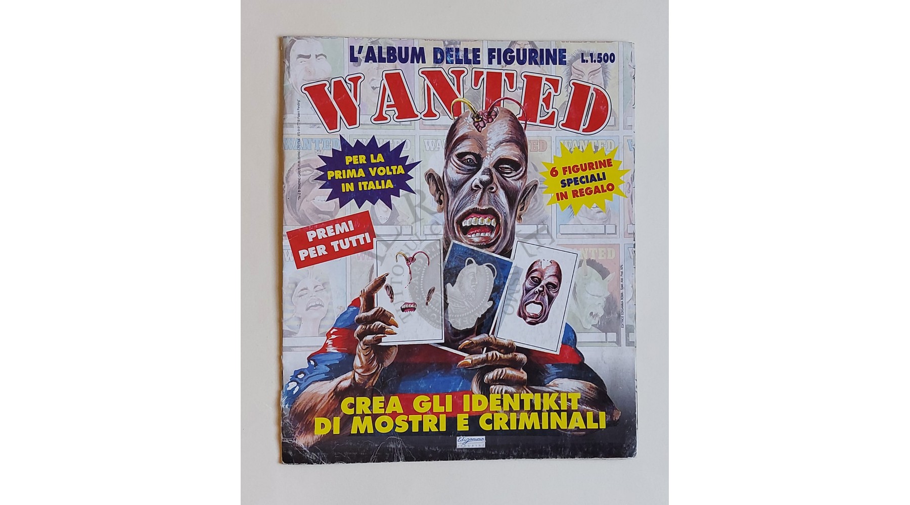 ALBUM DI FIGURINE WANTED EDIGAMMA ,VUOTO CON INSERTO CON FIGURINE IN BUONO STATO